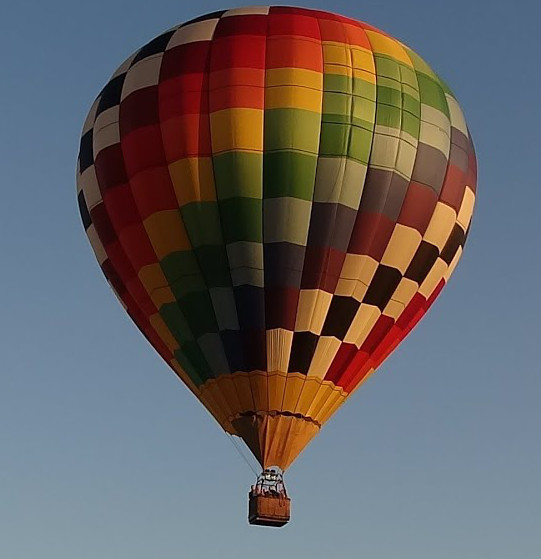 A hot air balloon doing a drive-by with Young Metro, because he doesn't trust you